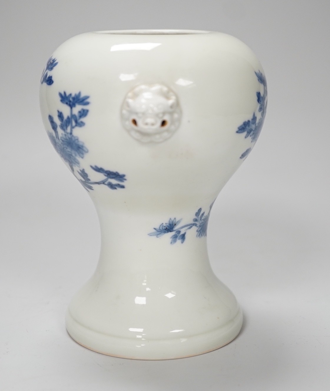 A Japanese blue and white vase, Meiji period, possibly Hirado, with lion mask handles. 13cm high